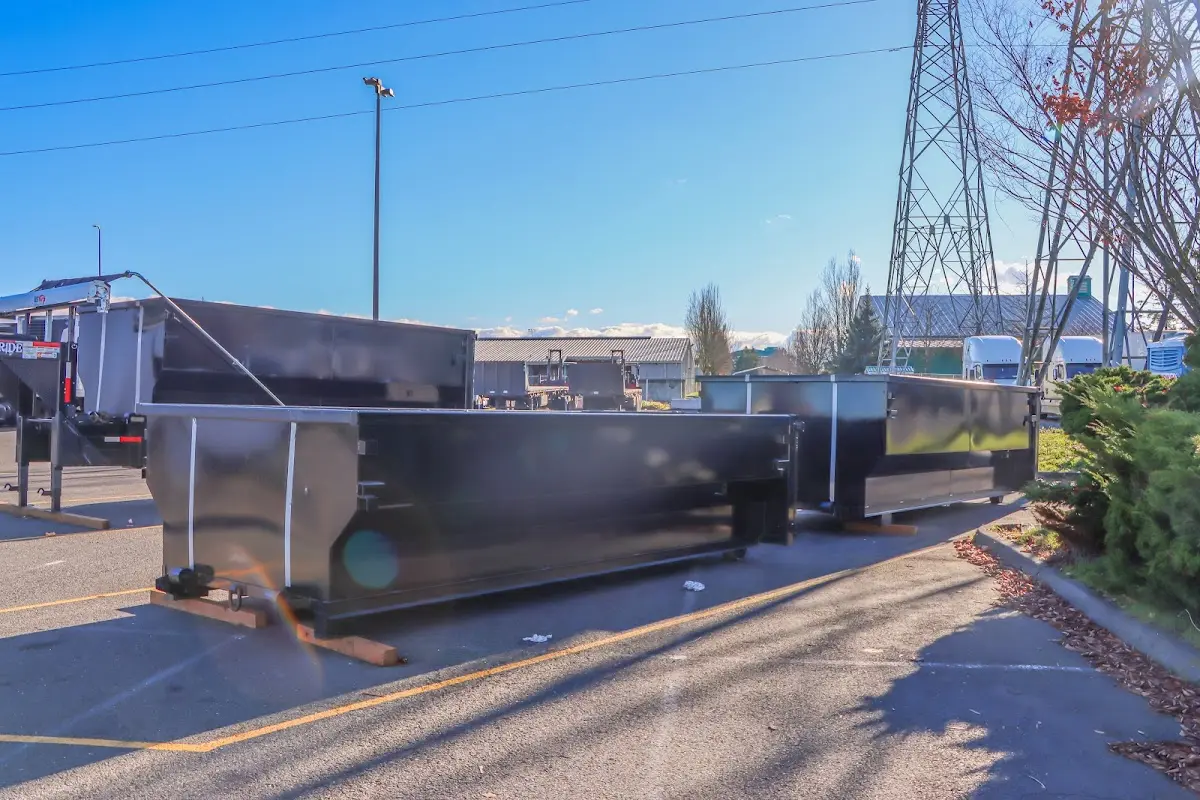Roll-off dumpster ready for waste disposal at job site for 15 Yard Dumpster Rental in Cornelia